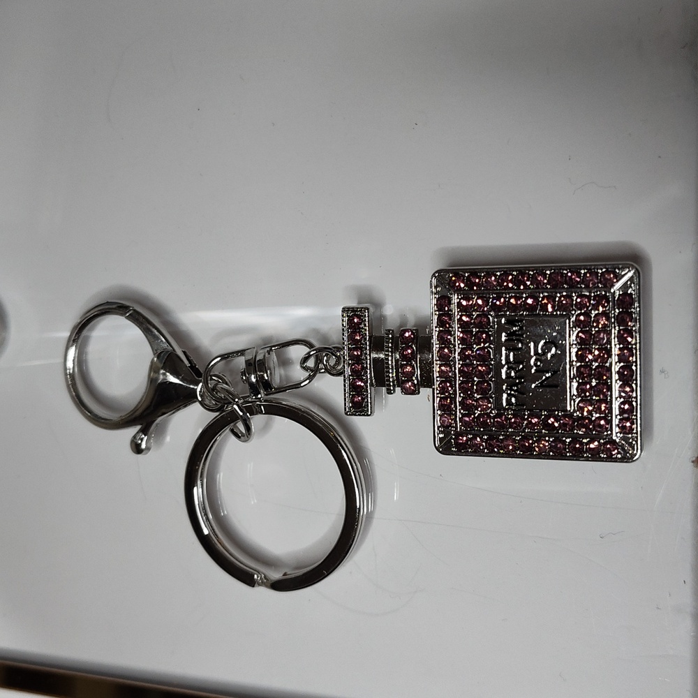 Elegant Silver and Pink Parfum Bottle Keychain